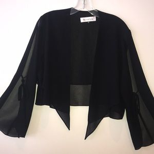 Sheer jacket with slits on the arms